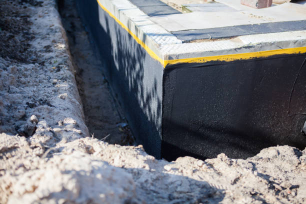Professional Emergency Waterproofing technician working in Altoona, WI